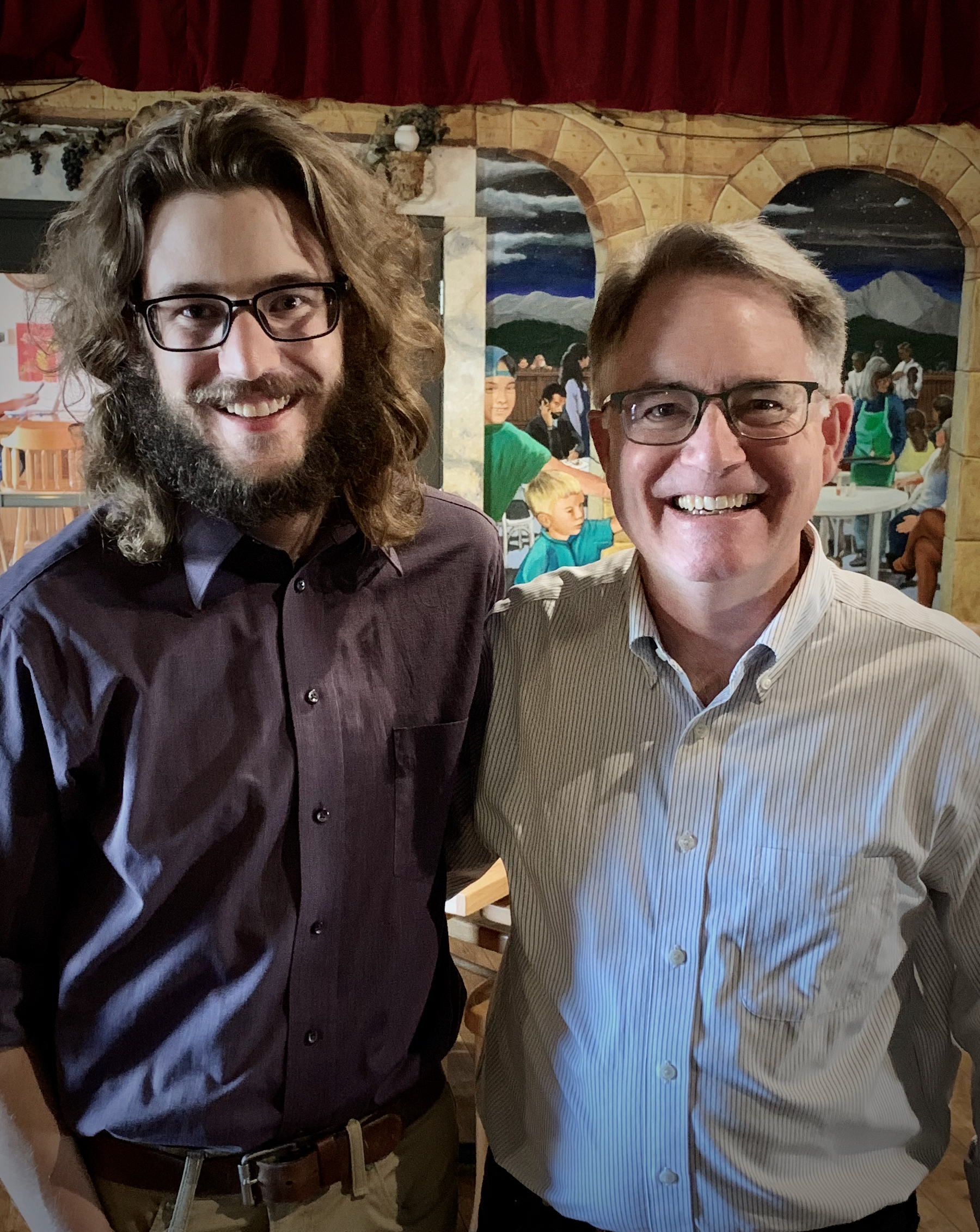 Josh standing with his MA advisor, Jeff Kasser